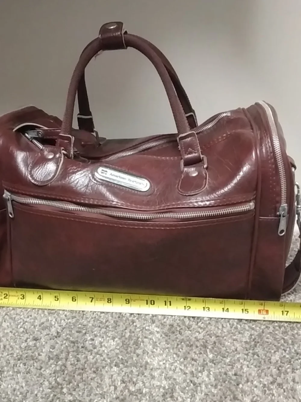 Vintage American Tourister Faux Leather Travel Duffel Bag Carry-on in Dark Red